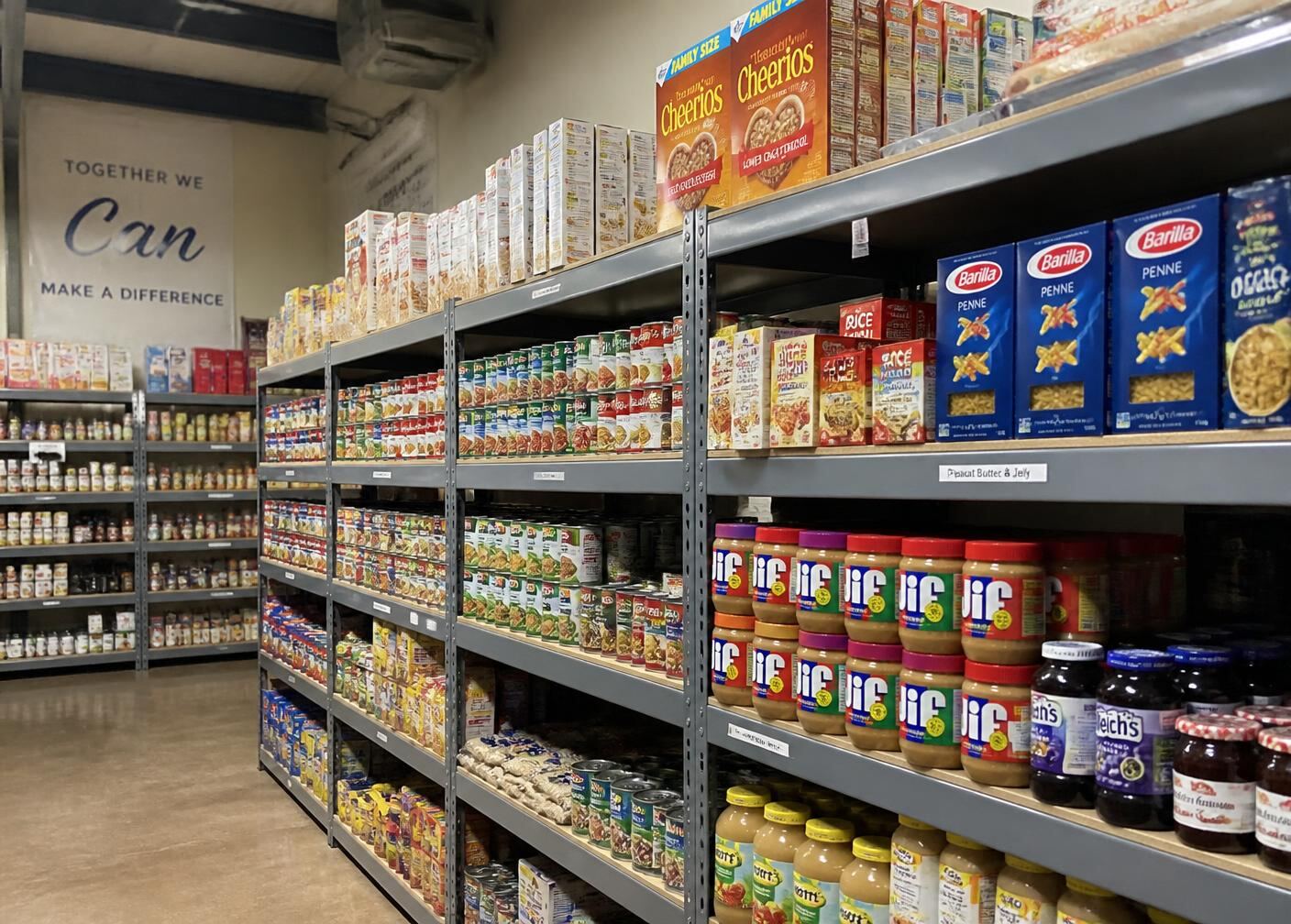 Pantry shelves stocked with canned goods and boxed staples
